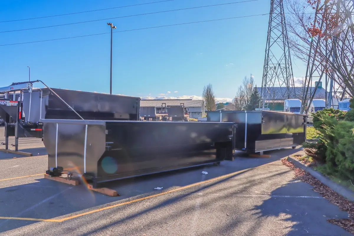 Roll-off dumpster ready for waste disposal at job site for 2 Yard Dumpster Rental in Woodbury